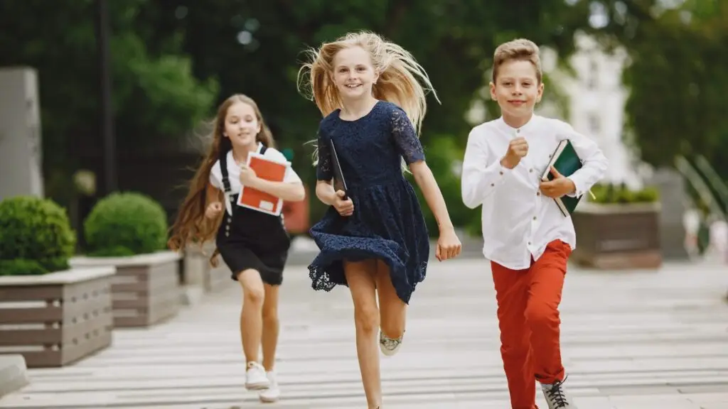 Happy children spend time together close and smile